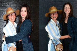 杨紫琼与安妮·海瑟薇拥抱合影笑容灿烂