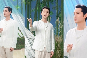 胡歌身穿白衣风度翩翩温和儒雅