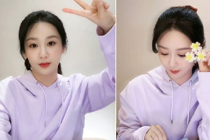 杨紫手拿鲜花对镜头比耶元气满满