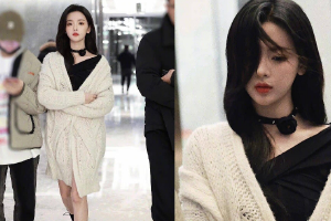 杨超越穿黑裙裹白毛衣秀美腿气质清冷