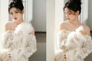 杨超越白色蕾丝裙造型曝光 清爽丸子头气质十足