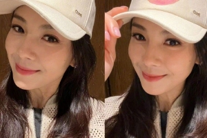 刘涛手扶帽檐嘴角一抹温柔甜笑