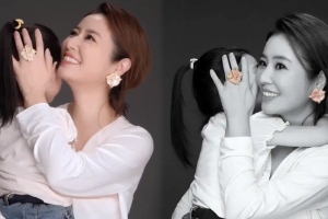 林心如首带女儿做公益小海豚灵气乖巧