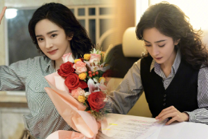 杨幂披肩卷发大气优雅