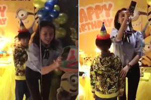 董洁为儿子庆生 顶顶害羞躲妈妈身后