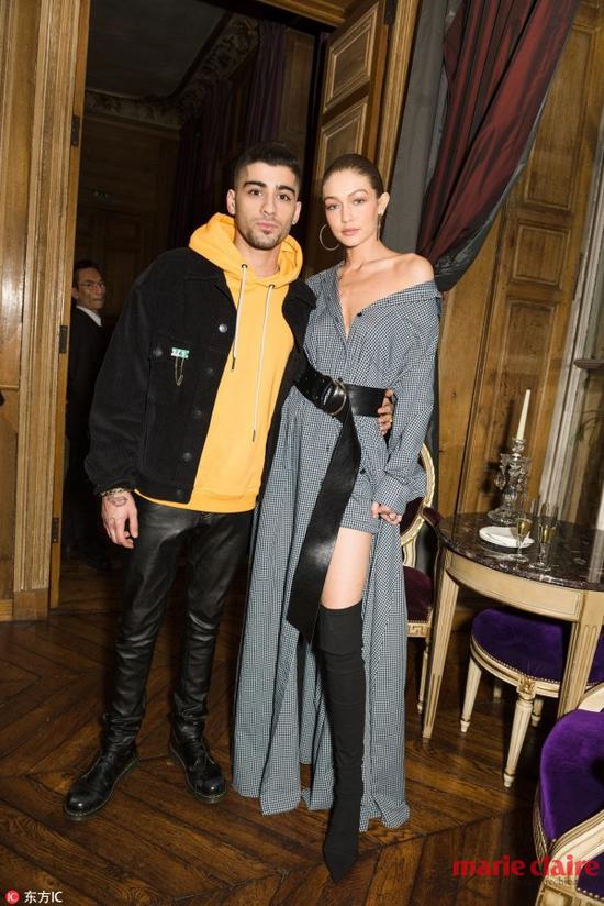 Zayn Malik, Gigi Hadid，身材比例一级棒的Gigi用一条长腰带强调了自己的无敌大长腿。