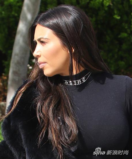 031016-kim-kardashian-saint-choker-lead