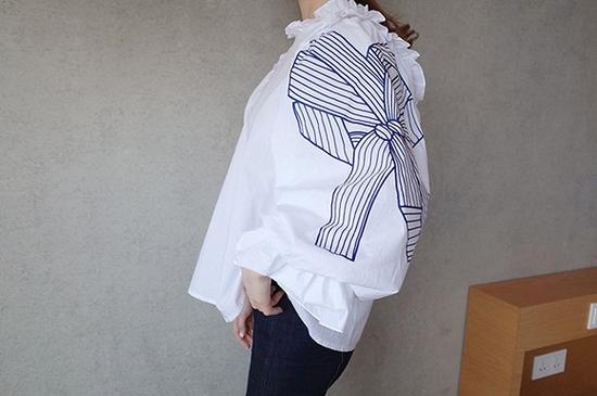minsshop，比如这件 泡泡喇叭袖上衣，32300韩元（约合人民币184.11元）