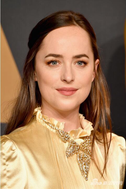 Dakota Johnson in Cartier