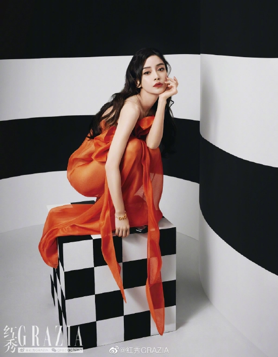 angelababy美国大片,angelababy剧照热门 angelababy摩登色彩大片橘色长裙搭中筒靴氛围感十足