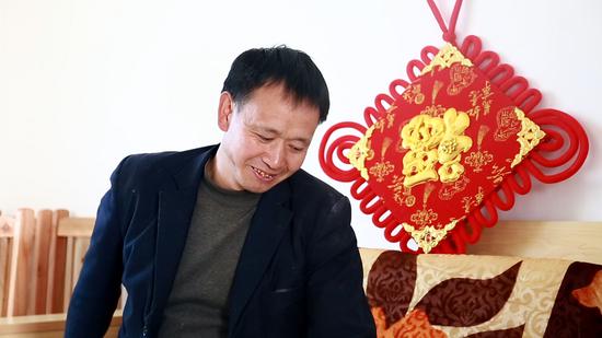 搬进恒大幸福新村的李平乐开了花