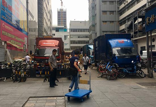 华强北山寨帝国崩塌:手机商为毁证18层扔下千