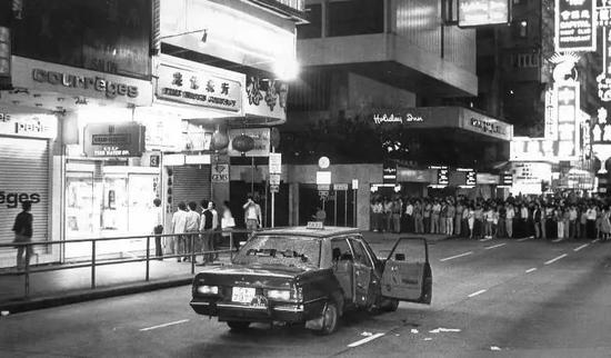 忠信表行劫案现场,弥敦道,1985年