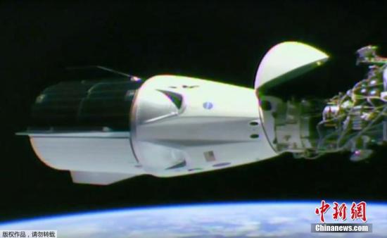 资料图:当地时间2019年3月3日,NASA在任务现场直播视频宣布,SpaceX载人龙飞船成功与国际空间站进行对接。