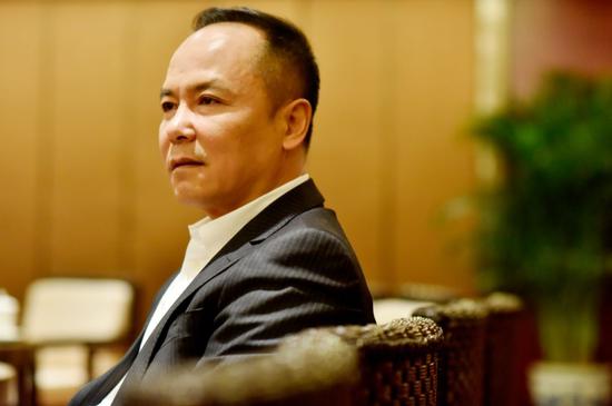 全国政协委员、银泰集团董事长 沈国军  图片来源：《中国企业家》杂志  摄影 / 史小兵