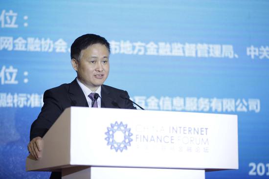 图为中国人民银行副行长、国家外汇管理局局长潘功胜