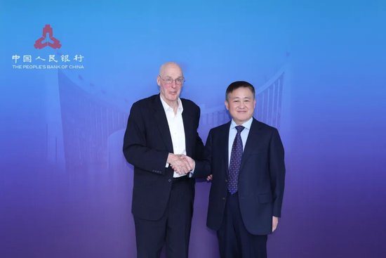 中国人民银行行长潘功胜会见美国前财政部长亨利·保尔森