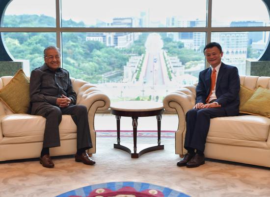 图说：马来西亚总理马哈蒂尔6月18日会见马云