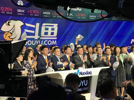斗鱼成功登陆纳斯达克。图片来源:新浪财经,摄影:魏天谌
