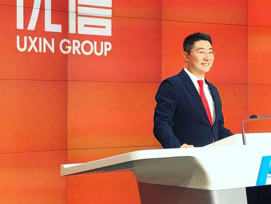 (优信CEO戴琨在上市现场致辞 摄/周瑶洁)