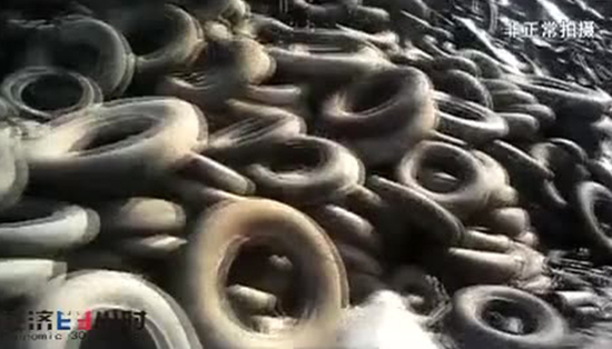 毒跑道竟是工业废料 黑窝点离北京不到200公