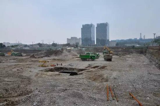 △资料图：北京一楼盘建筑工地。（来源：CFP）