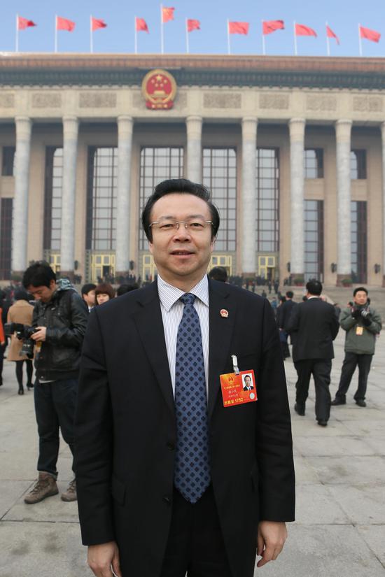 赖小民代表:加快构建我国区域性国际金融体系