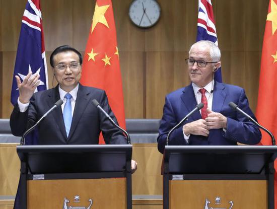 3月24日，国务院总理李克强同澳大利亚总理特恩布尔在第五轮中澳总理年度会晤后共同会见记者并回答提问。新华社记者 庞兴雷 摄