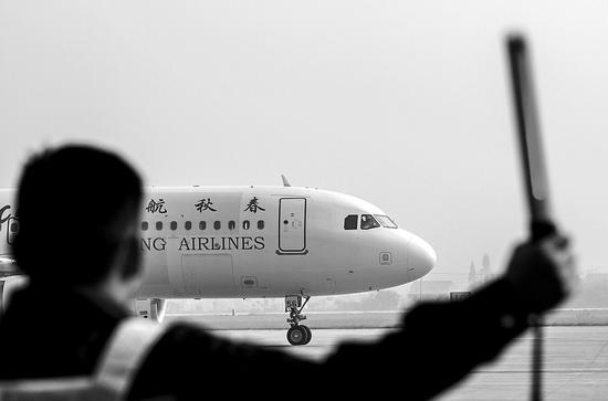 同航班中日版本燃油费差近300元 春秋航空回应与汇率变化有关