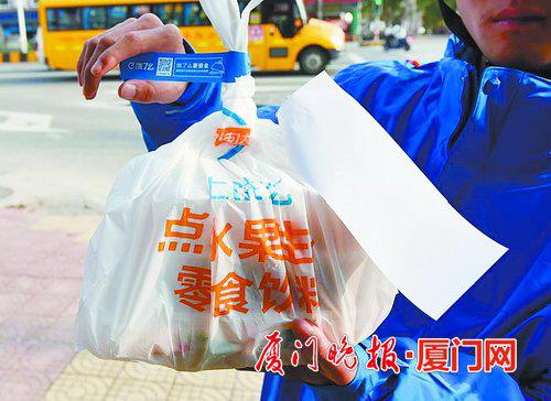 ■我市不少商家均已使用封签。 陈嘉新 摄