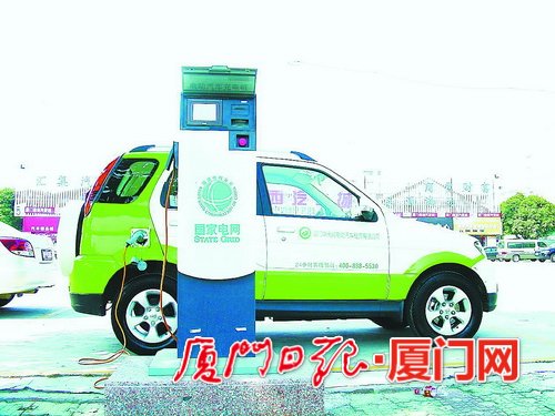 这样的新能源汽车充电站将越来越多。（资料图）