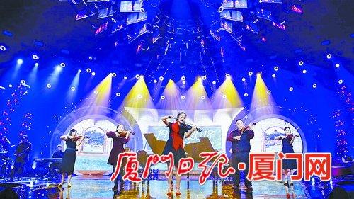 杨璟和当年师生在《中国梦想秀》奏响《鼓浪屿之波》。