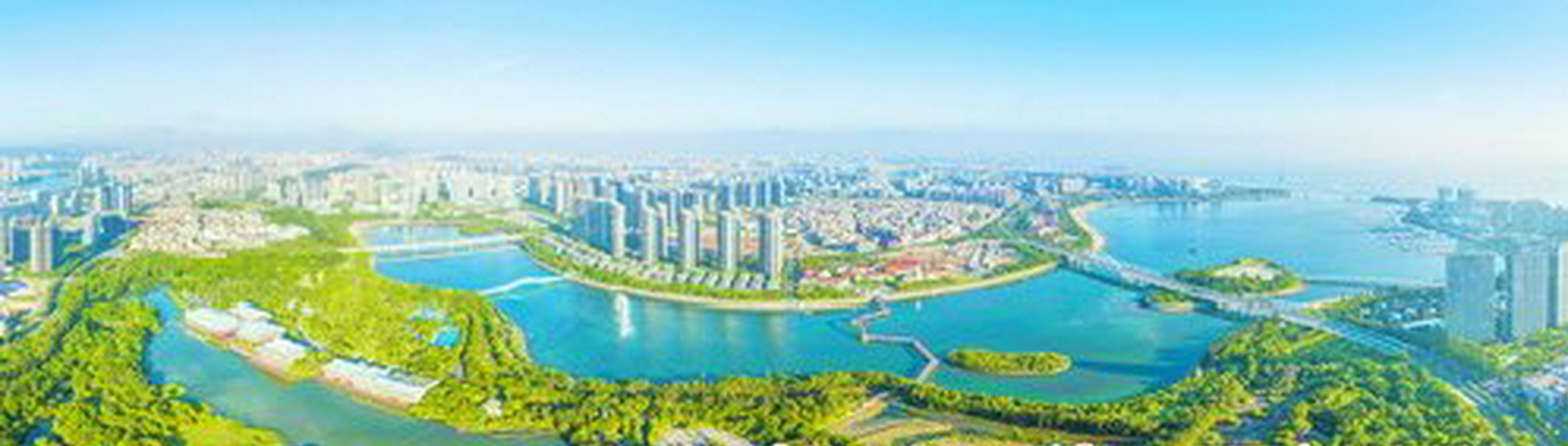湖里区从昔日的小渔村华丽变身,闯出了一条跨越式前进的新路。图为美丽的五缘湾。(本报记者 王火炎 航拍器摄)