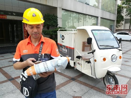 晋江规范合法后的电动快递三轮车。