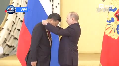 习近平：我将珍藏这枚中俄友谊的勋章