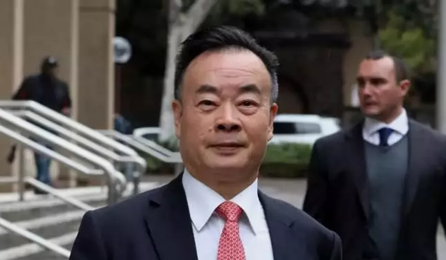 状告澳媒诽谤获赔偿潮商周泽荣胆识霸气兼备击败中国渗透炒作