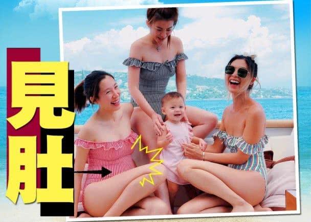 身穿比基尼的李美慧孕肚已经非常明显了,不过四肢仍然很是纤细,不看
