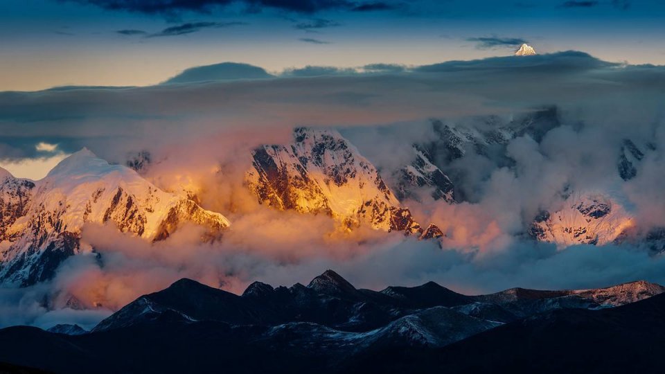 比贡嘎山更仙，曾为中国最美山峰第一名，说十人九不遇