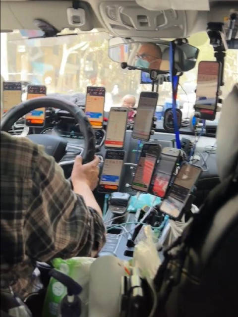 网约车司机11台手机同时接单