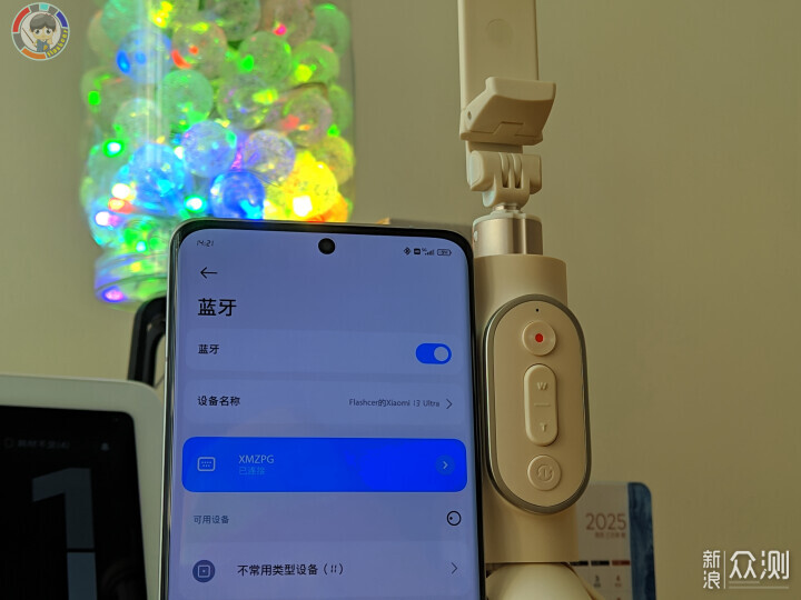 Ta，不僅增加三腳架底座的長度，也可一鍵變焦_新浪眾測