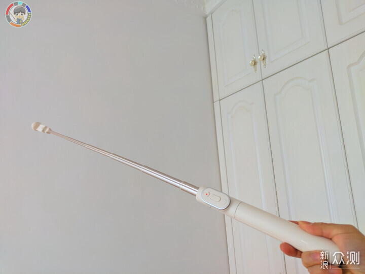 Ta，不僅增加三腳架底座的長度，也可一鍵變焦_新浪眾測