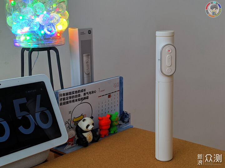 Ta，不僅增加三腳架底座的長度，也可一鍵變焦_新浪眾測