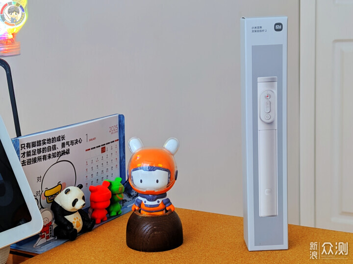 Ta，不僅增加三腳架底座的長度，也可一鍵變焦_新浪眾測