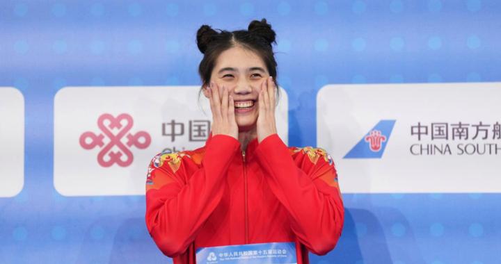 张雨霏在《人民日报》发文：我特意扎起丸子头，仿佛再次成为勇敢的“哪吒”