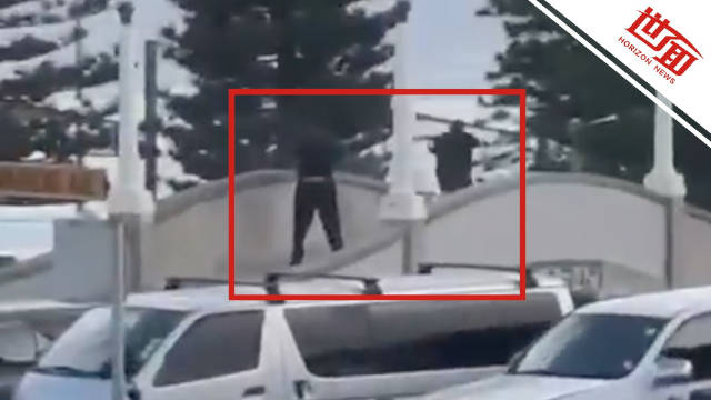 澳枪击事件黑衣人开枪瞬间曝光：澳海滩枪击现场数千人四散奔逃