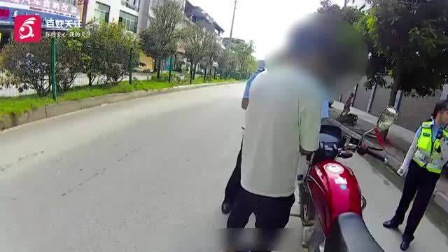 隔夜酒还没醒 男子骑摩托车出门遇交警