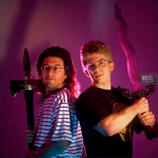 两位约翰：罗梅洛（左）和卡马克（右），照片摄于1990年