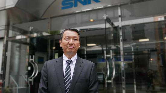 SNK代表取缔役会长外山公一