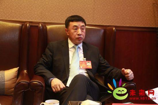 全国人大代表、中国宇华教育集团董事局主席李光宇