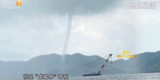 何先生：“当时大概有两三公里远吧，乌云上面有雨雾，雨雾里面有一条向龙卷风一样的东西，估计（直径）有17米那么粗。”